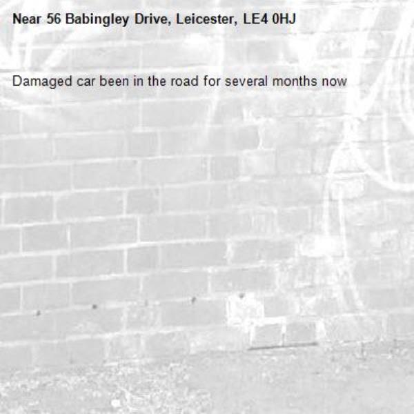 Damaged car been in the road for several months now -56 Babingley Drive, Leicester, LE4 0HJ