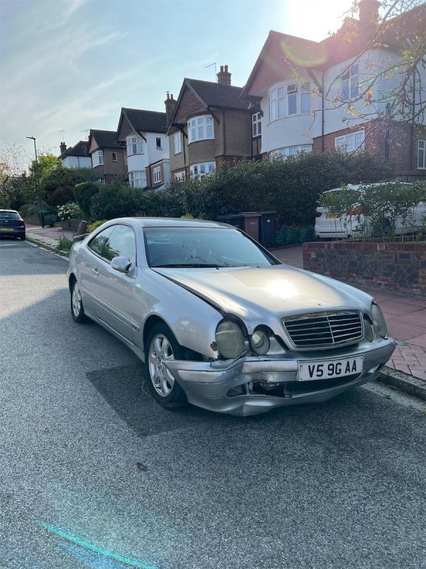 This véhicule has been left on the same spot on the street for more than a month, and looks visibly damaged-54 Wood Vale, Hornsey, London, N10 3DN