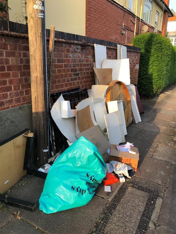 Rubbish from the shared entry for Fosse Road South at the side of 77 Beaconsfield Road. -132 Beaconsfield Road, Leicester, LE3 0FF