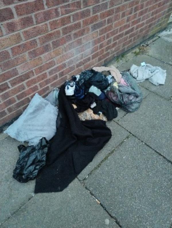clothes abandoned on the corner of Hazelwood road and keddleston road -22 Kedleston Road, Leicester, LE5 5HU