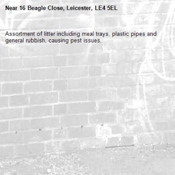 Assortment of litter including meal trays, plastic pipes and general rubbish, causing pest issues.-16 Beagle Close, Leicester, LE4 5EL