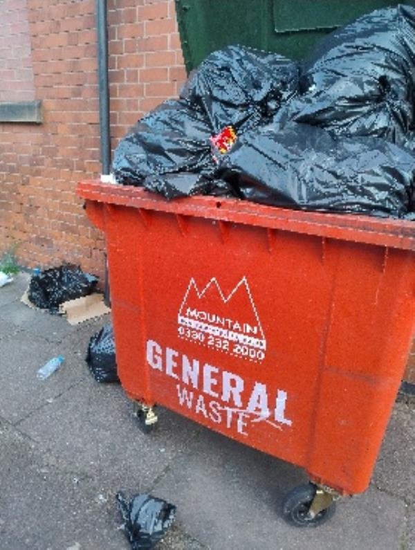 overflowing commercial bin possibly belongs to uncle j's kitchen, left at the top of Sawley street.-2 Sawley Street, Leicester, LE5 5JQ