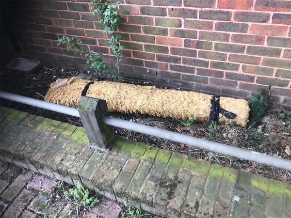 44-54. Please clear flytip of a roll of carpet from side of block in Maroons Way-54 Sedgehill Road, Bellingham, London, SE6 3QS