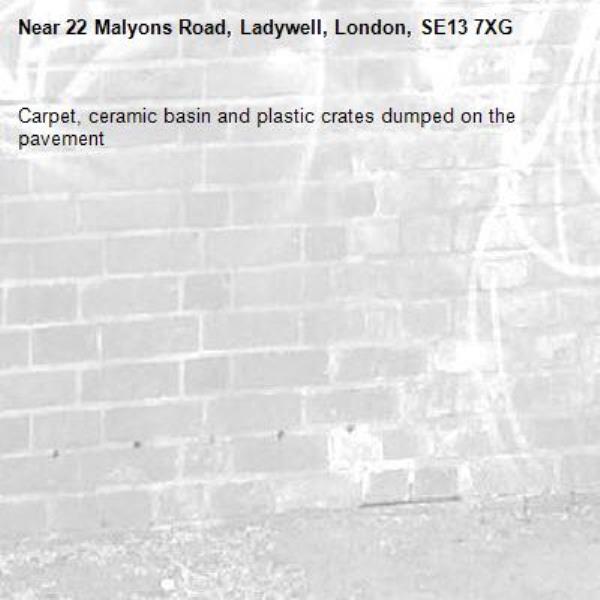 Carpet, ceramic basin and plastic crates dumped on the pavement -22 Malyons Road, Ladywell, London, SE13 7XG