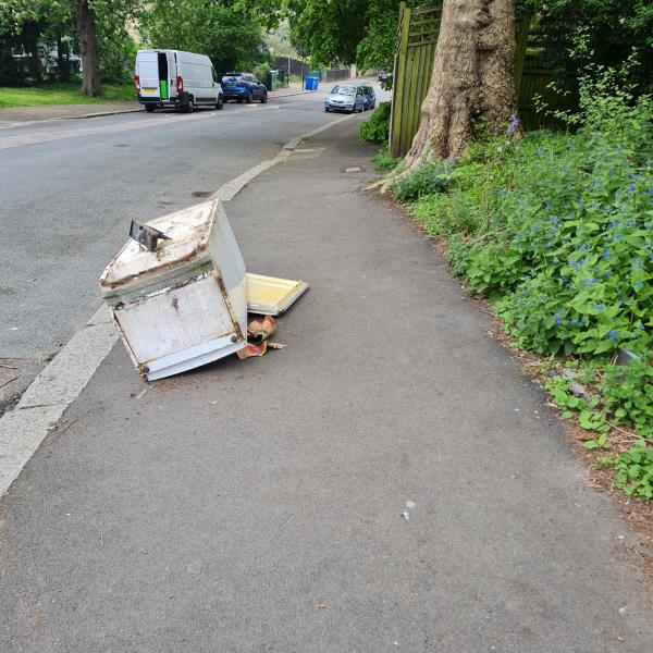 Fridge dumped on pavement by garages on dacres Road, opposite Hennel Close. Obstruction on footpath -30A, Hyndewood, Forest Hill, London, SE23 2NX