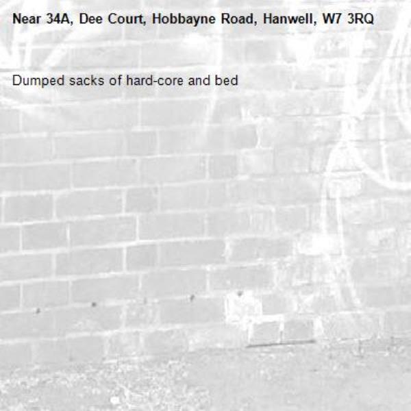 Dumped sacks of hard-core and bed-34A, Dee Court, Hobbayne Road, Hanwell, W7 3RQ