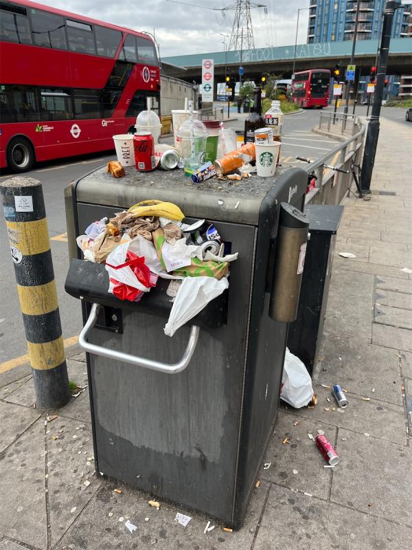 Bin overflowing -The Cafe, Bus Station, Silvertown Way, Canning Town, London, E16 1DG