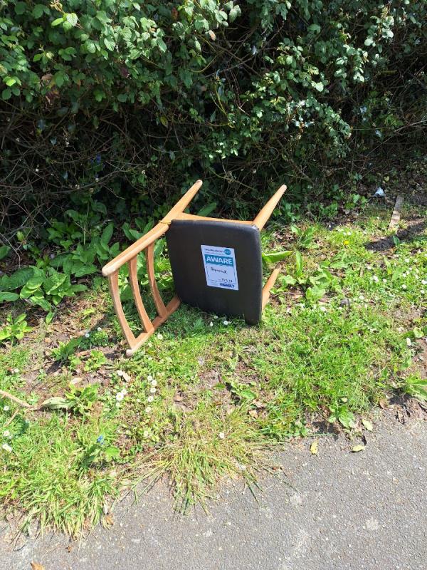 Wooden chair black seat, 
Junction of French gate, knoll crescent on the hydneye.-41 The Hydneye, Eastbourne, BN22 9BY