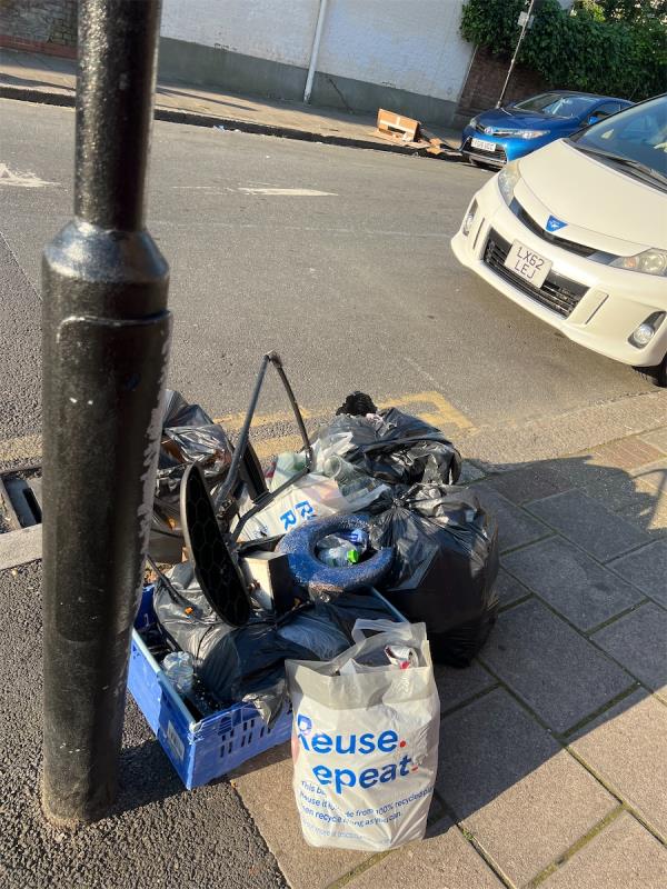 Flytipping rubbish - both sides of the street-212 Sherrard Road, Manor Park, London, E12 6UF