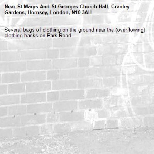 Several bags of clothing on the ground near the (overflowing) clothing banks on Park Road-St Marys And St Georges Church Hall, Cranley Gardens, Hornsey, London, N10 3AH
