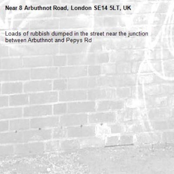 Loads of rubbish dumped in the street near the junction between Arbuthnot and Pepys Rd-8 Arbuthnot Road, London SE14 5LT, UK