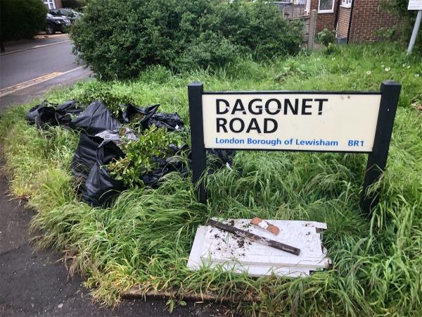Junction of Roundtable Road. Please clear bags of garden waste from grass area (2)-16 Dagonet Road, Bromley, BR1 5LR