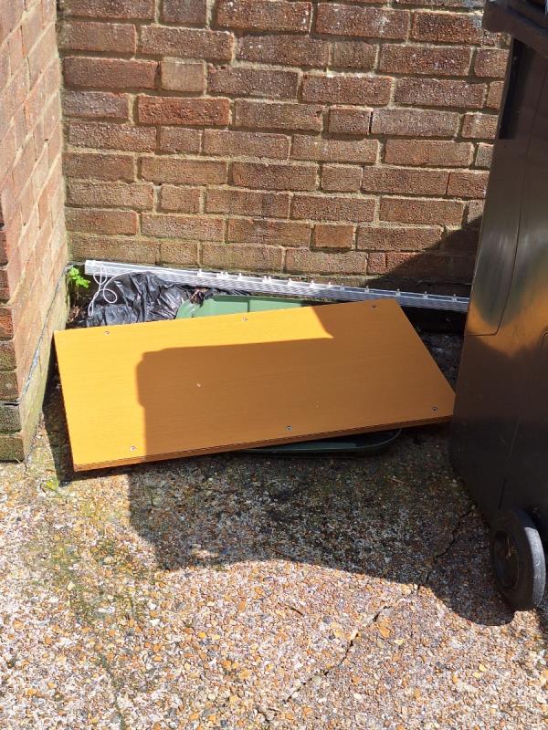 Broken up cupboard, and curtain rail dumped on the drying area. -Cumberland Court, Rockhurst Drive, Eastbourne, BN20 8UP