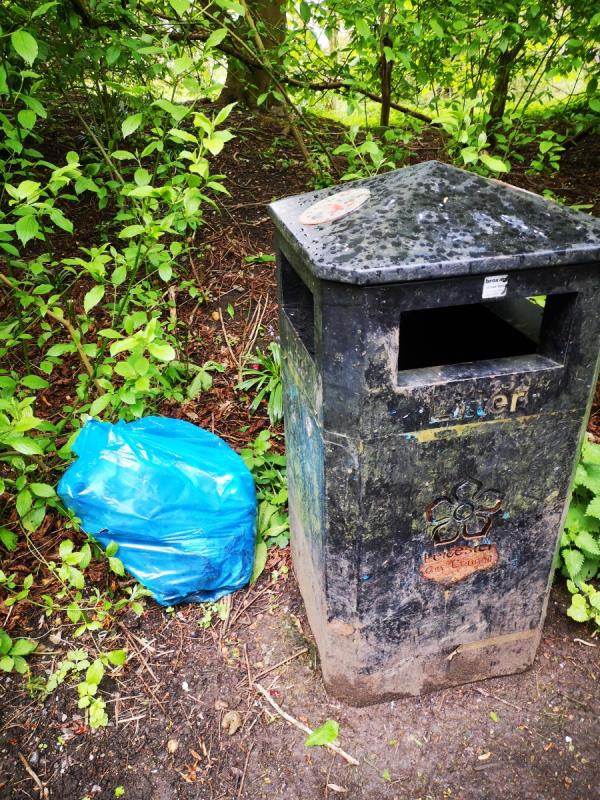 One bag general litter left at bin -Riverside Park