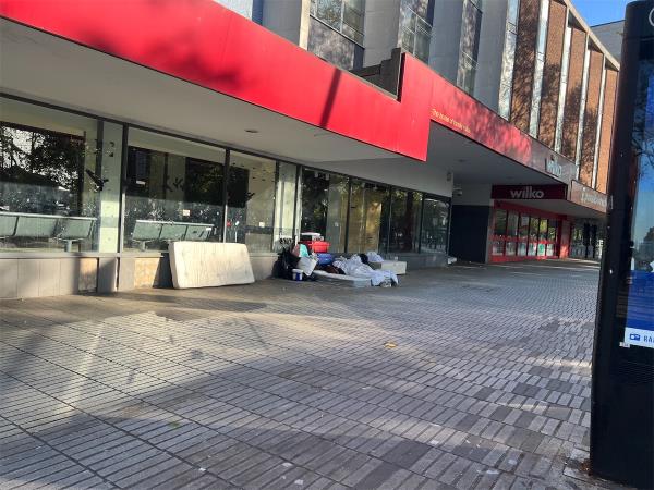 Rubbish pile on pavement-Cell City, 72 Broadway, Stratford, London, E15 1NG