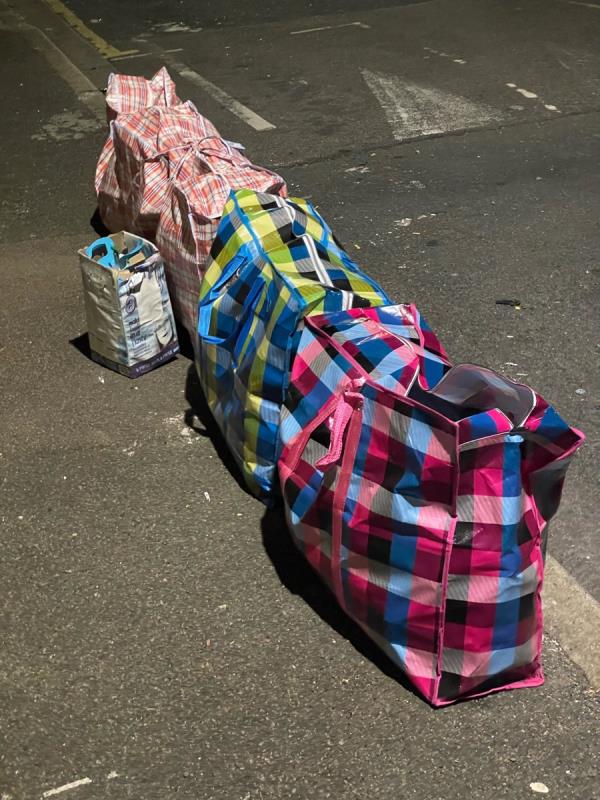 Laundry bags full of rubbish-57 Denbigh Road, East Ham, E6 3LF