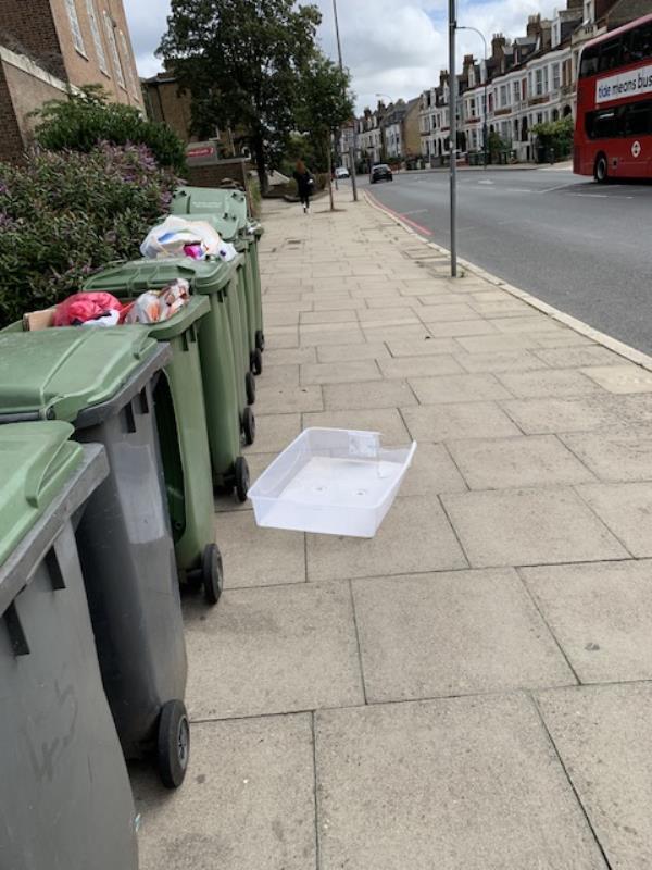 Please clear overflowing bins on main Lee High road. Wind blowing refuse into major traffic road..se13 near Manor Park -Lee High Road, London