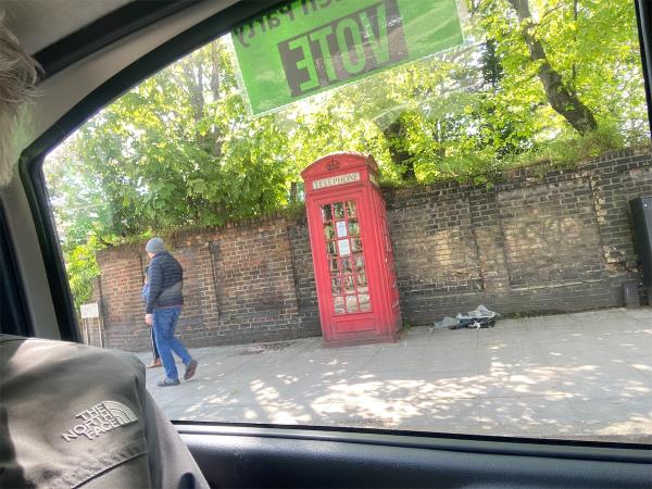 Dumped rubbish by telephone box free library (looks similar to stuff dumped in Hilly Fields near corner of Montague Avenue and Hilly Fields Crescent -63A, Loampit Hill, Lewisham, London, SE13 7SZ