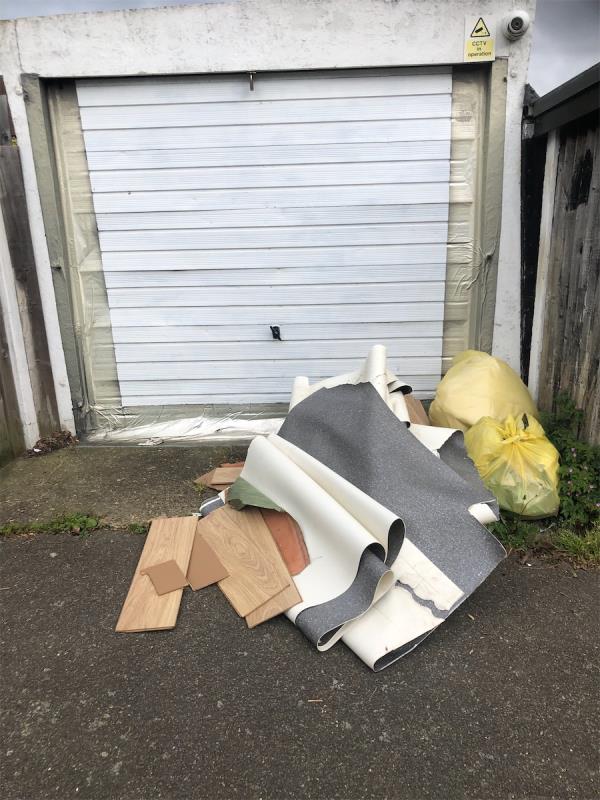 Please clear flytip of carpet from outside garage door-28 Whitefoot Terrace, Bromley, BR1 5SH