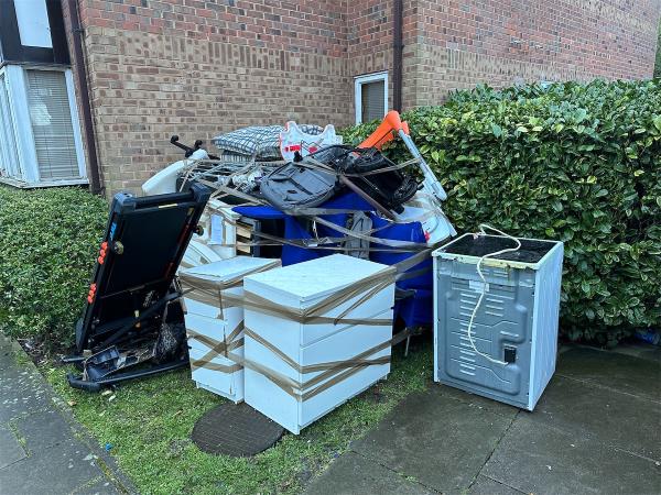 Huge amounts of flytipping on pavement -Braemar Court, Cumberland Place, London, SE6 1LD