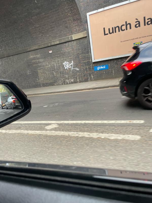 Spray tags on bridge wall -709 Greenford Road, Greenford, UB6 8QL