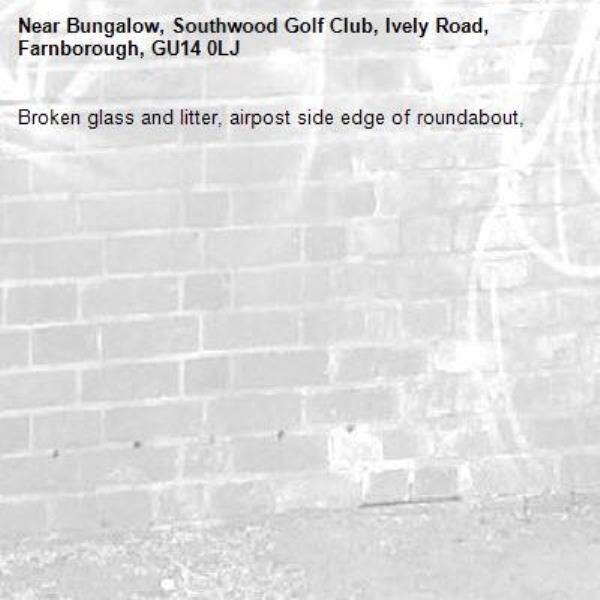 Broken glass and litter, airpost side edge of roundabout, -Bungalow, Southwood Golf Club, Ively Road, Farnborough, GU14 0LJ