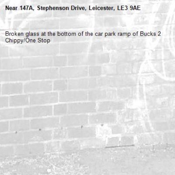 Broken glass at the bottom of the car park ramp of Bucks 2 Chippy/One Stop-147A, Stephenson Drive, Leicester, LE3 9AE