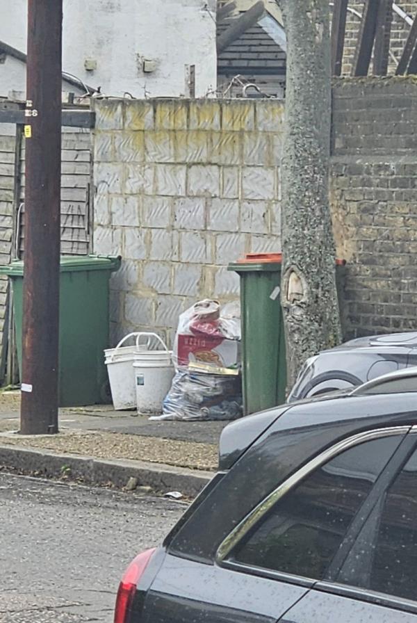 Someone has fly tipped a load of rubbish on the pavement -16 St Johns Terrace, Forest Gate, London, E7 8BX