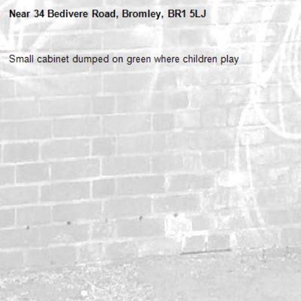 Small cabinet dumped on green where children play-34 Bedivere Road, Bromley, BR1 5LJ