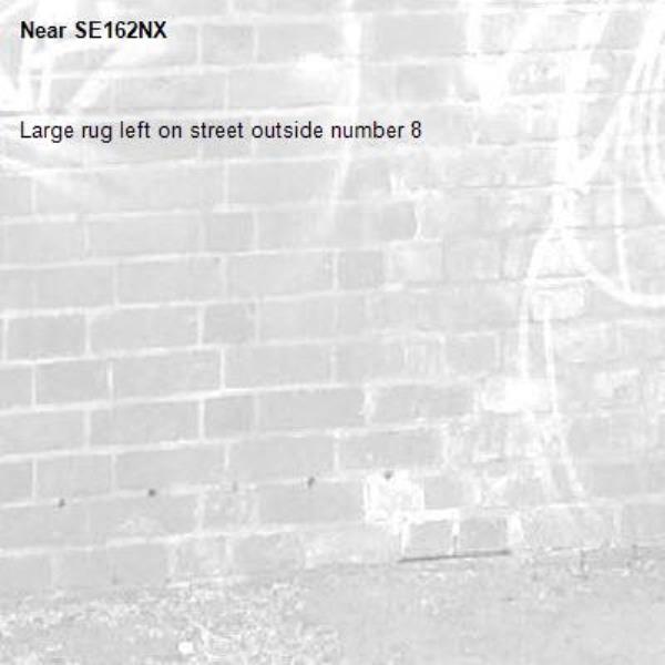 Large rug left on street outside number 8-SE162NX 