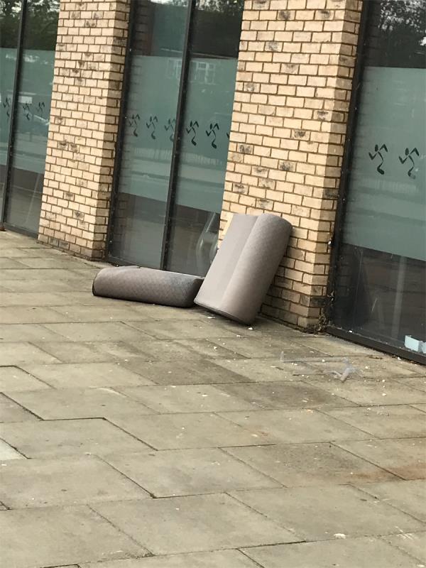 Seems like parts of a sofa discarded on the pavement-Pacific Building, 154 Leyton Road, Stratford, London, E15 1GA