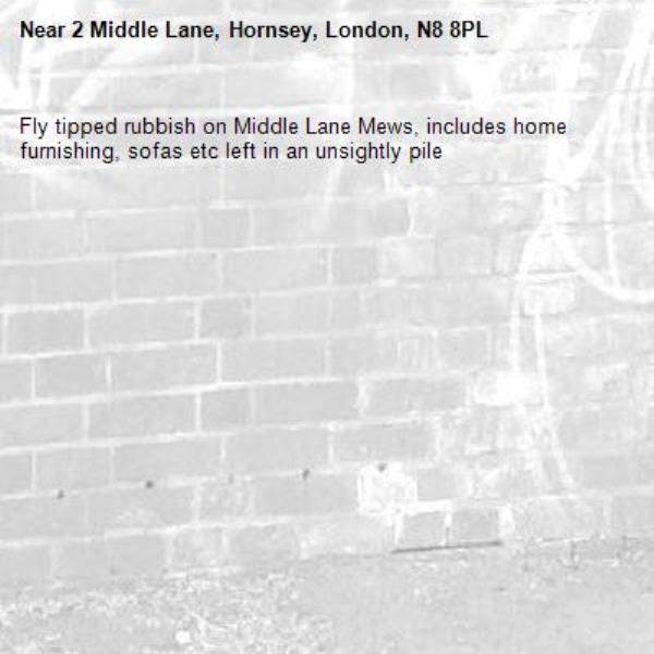 Fly tipped rubbish on Middle Lane Mews, includes home furnishing, sofas etc left in an unsightly pile-2 Middle Lane, Hornsey, London, N8 8PL