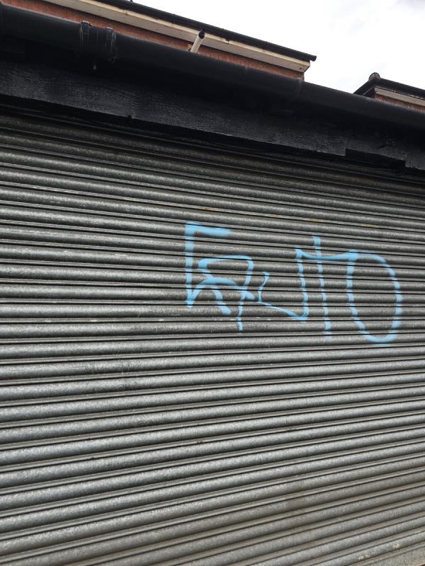 Tagging on shutter -80 North Road, Southall, UB1 2JL