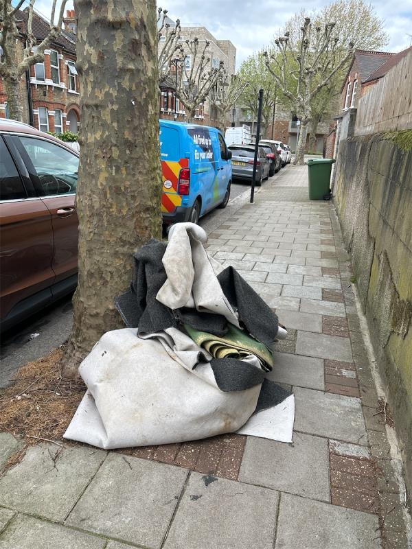Someone left some carpets and large rubbish-34 Claude Road, Upton Park, London, E13 0QB