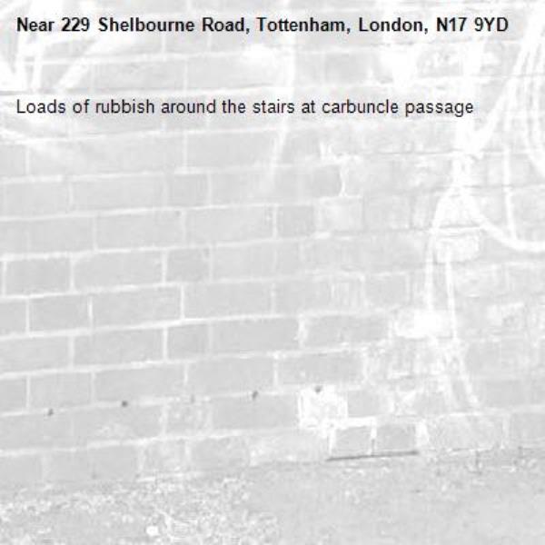 Loads of rubbish around the stairs at carbuncle passage-229 Shelbourne Road, Tottenham, London, N17 9YD
