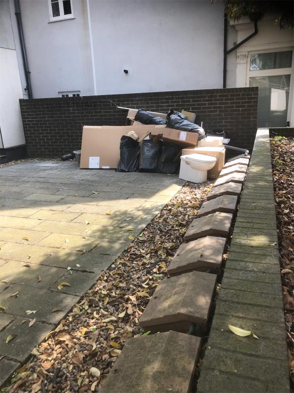 Please clear a large amount of waste from front garden-Flat 1, 117 Lewisham Way, London, SE14 6QJ