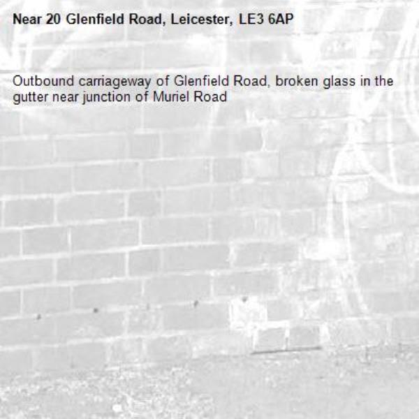 Outbound carriageway of Glenfield Road, broken glass in the gutter near junction of Muriel Road-20 Glenfield Road, Leicester, LE3 6AP