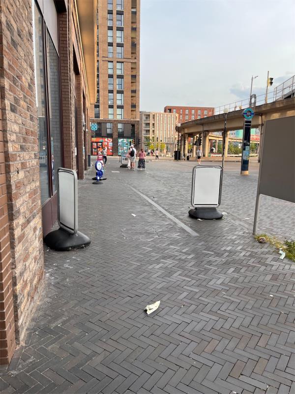 Litter blowing everywhere in front of Gallions Point.-11 Atlantis Avenue, Beckton, London, E16 2UD
