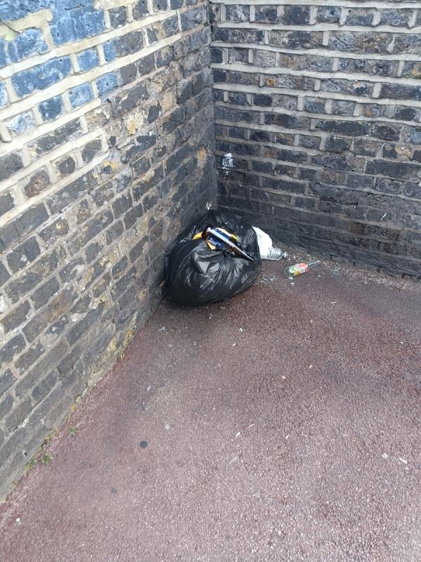 Bin bag at foot of the bridge by bridge road-Southend Road, East Ham, London