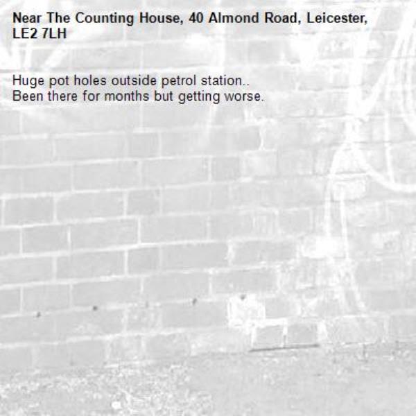 Huge pot holes outside petrol station.. 
Been there for months but getting worse. 
-The Counting House, 40 Almond Road, Leicester, LE2 7LH