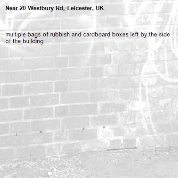 multiple bags of rubbish and cardboard boxes left by the side of the building-20 Westbury Rd, Leicester, UK