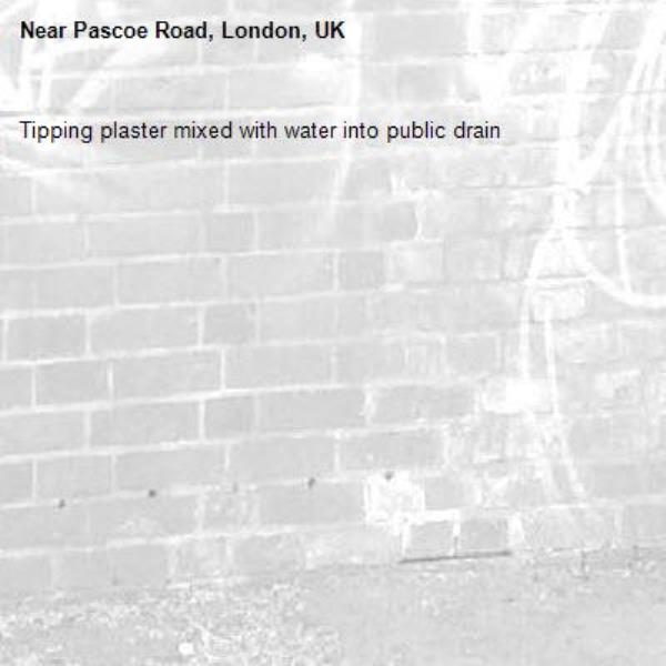 Tipping plaster mixed with water into public drain-Pascoe Road, London, UK