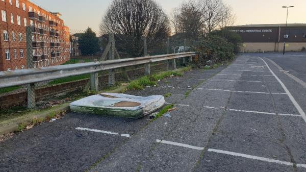 Mattress and broken mirror dumped in car park near Delivery Office.-Perystreete Perry Vale, Forest Hill, SE23 2LF, England, United Kingdom