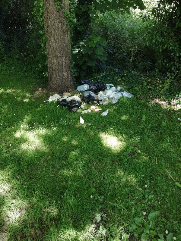 Household waste dumped off car park underneath tree. -Newbridge Wharf New Road, Newbridge, WV6 0JX