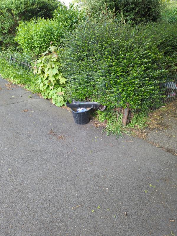 Flytipped bucket and guttering -7 Riddons Road, Grove Park, London, SE12 9RB