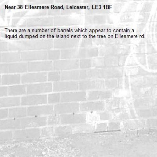 There are a number of barrels which appear to contain a liquid dumped on the island next to the tree on Ellesmere rd.-38 Ellesmere Road, Leicester, LE3 1BF