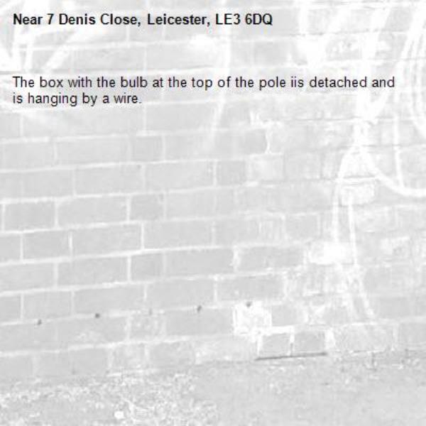 The box with the bulb at the top of the pole iis detached and is hanging by a wire.-7 Denis Close, Leicester, LE3 6DQ