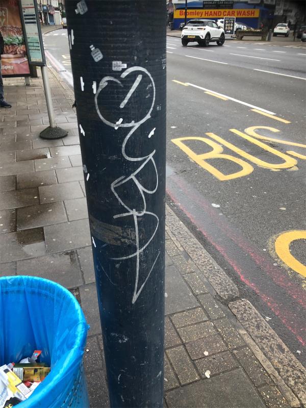Remove graffiti from lamppost by bus stop-425 Bromley Road, London, BR1 4PJ