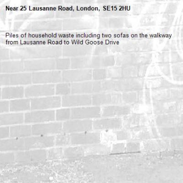Piles of household waste including two sofas on the walkway from Lausanne Road to Wild Goose Drive-25 Lausanne Road, London, SE15 2HU