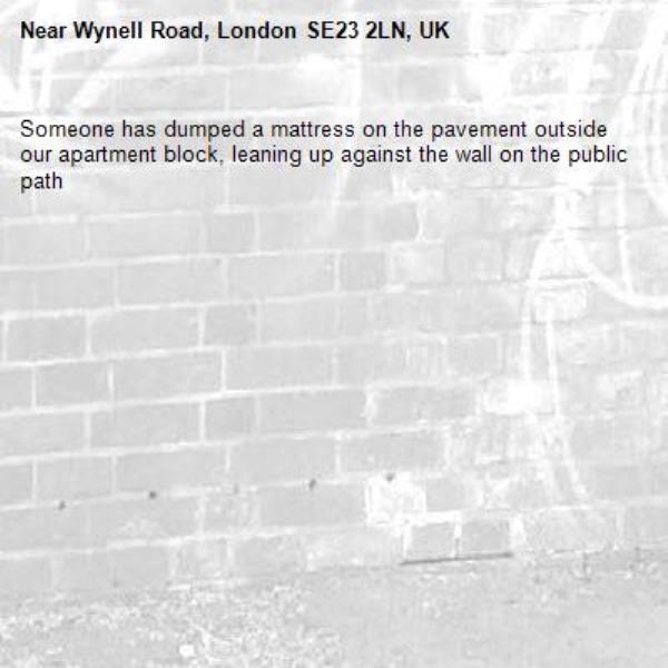 Someone has dumped a mattress on the pavement outside our apartment block, leaning up against the wall on the public path -Wynell Road, London SE23 2LN, UK